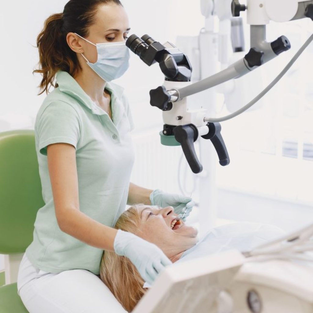 A patient being treated comfortably in a modern dental office
